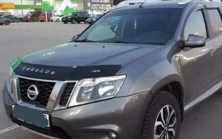 Дефлектор капота (мухобойка) NISSAN Terrano с 2013 г.в.  (Ниссан Терано) Вип Тюнинг